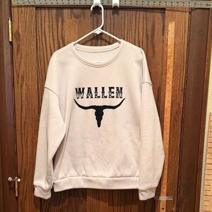 Morgan Wallen cream colored sweatshirt